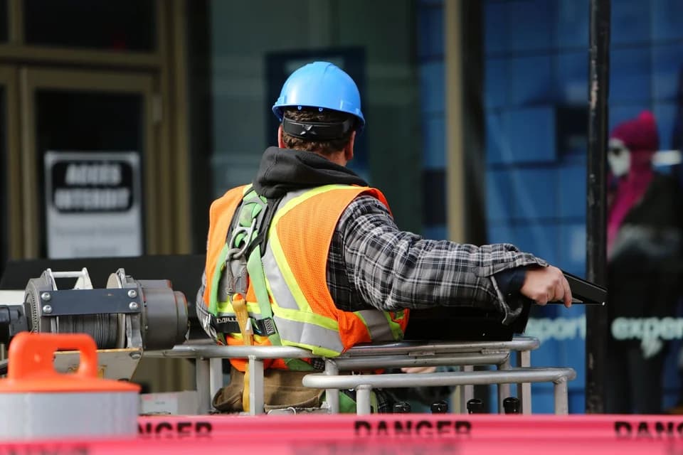 Male professional in a representative construction & building trades workplace